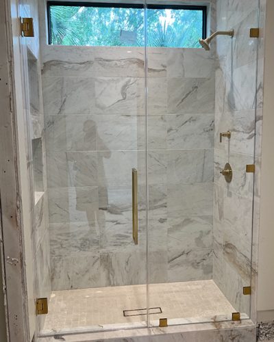shower-glass-enclosure-gold-brackets-glass-door